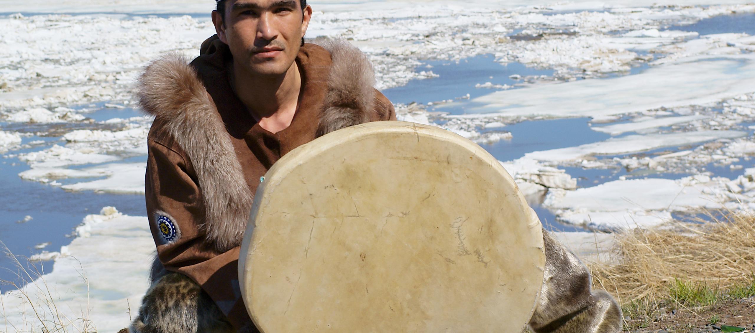 Indigenous Person Posing with Drum